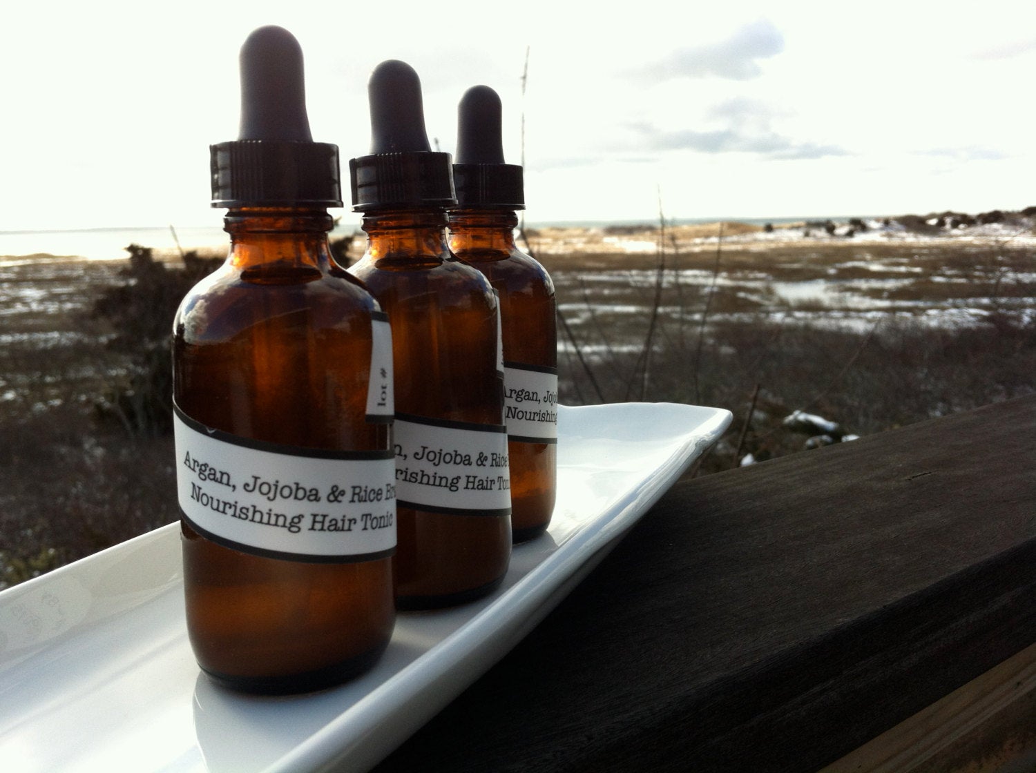 Halo Hair Oil Treatment: Argan, Jojoba, Abyssinian, & Rice Bran Oils.