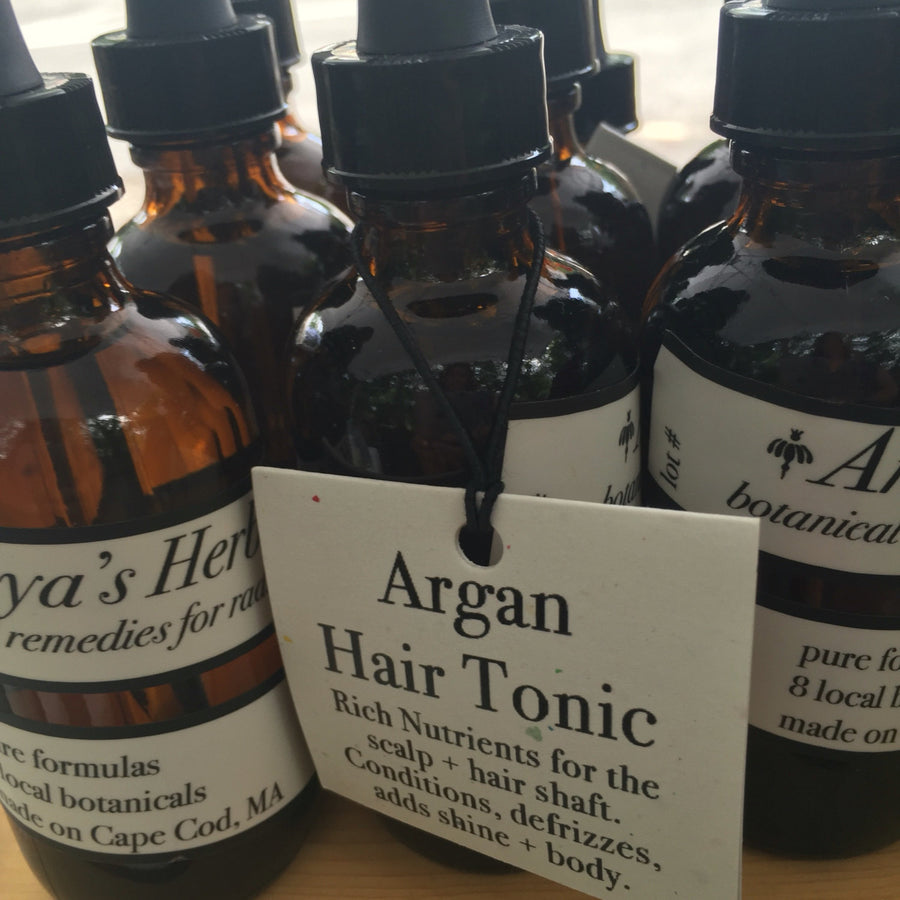 Halo Hair Oil Treatment: Argan, Jojoba, Abyssinian, & Rice Bran Oils.